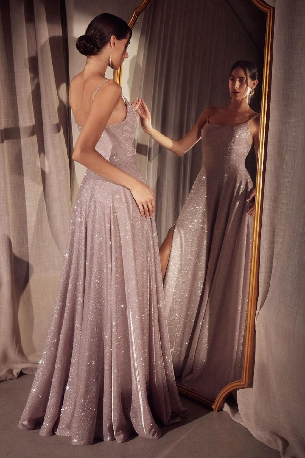 Champagne glitter A-line gown, back view with spaghetti straps and flared skirt