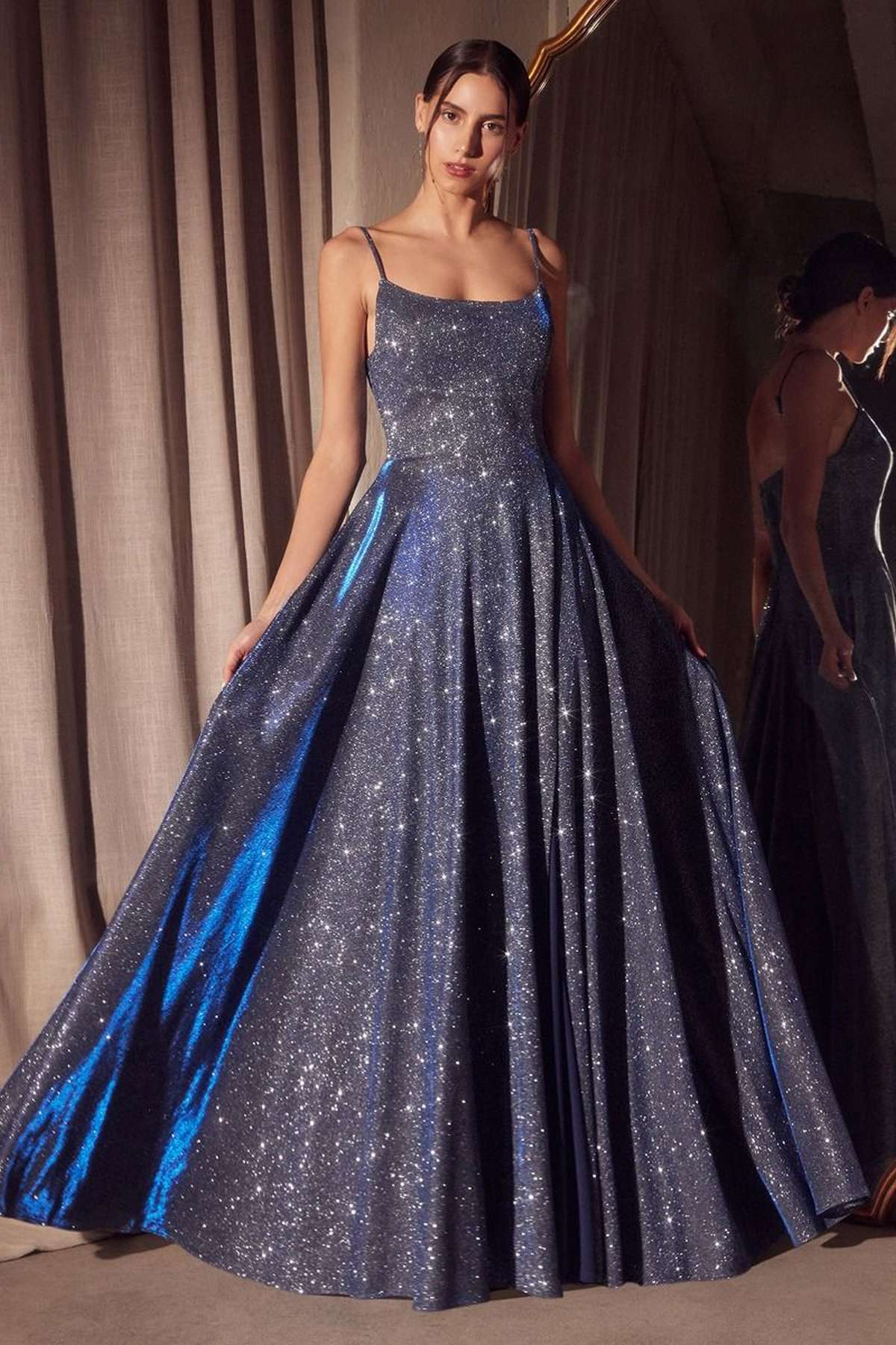 Blue glitter A-line gown with spaghetti straps and full flared skirt