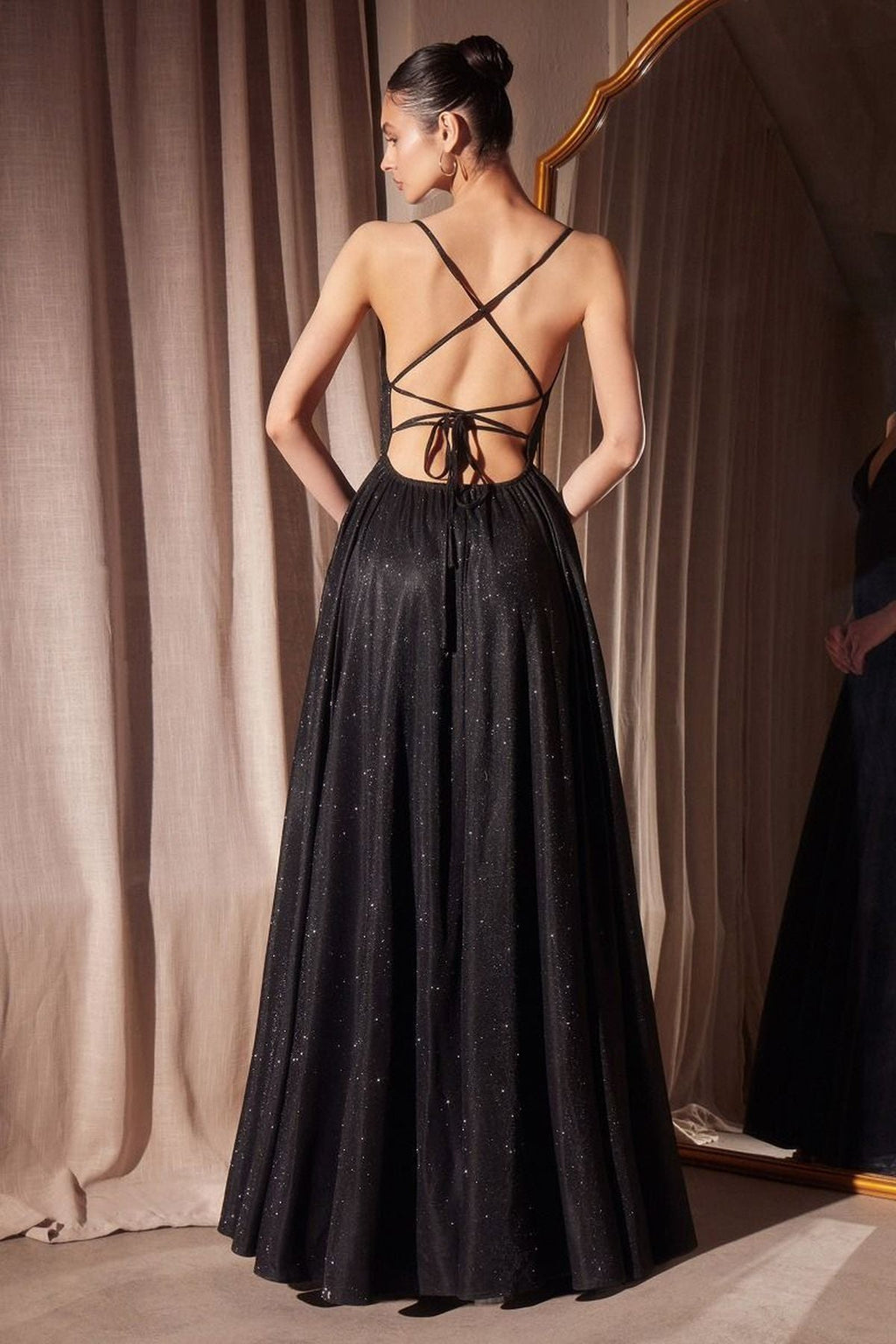 Black glitter A-line gown back view with crisscross spaghetti straps and open back