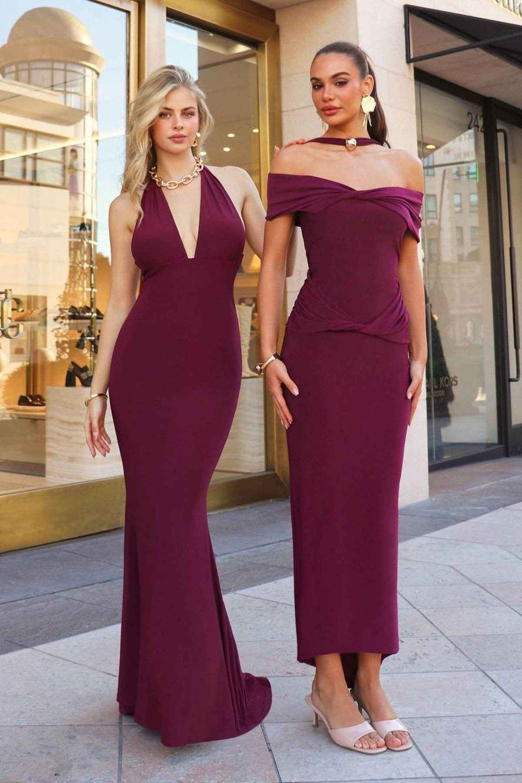 Wine fitted stretch halter gown with draped neckline and floor-length column hem