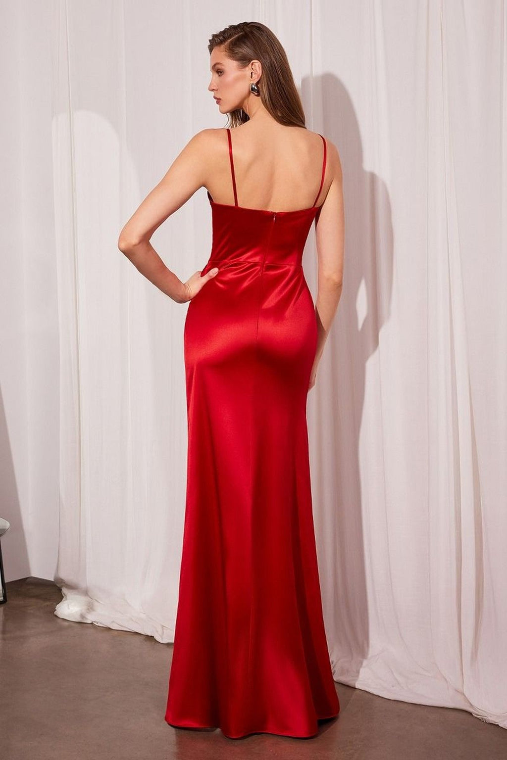 Red satin prom gown with corset bodice, spaghetti straps, long fitted skirt and slit