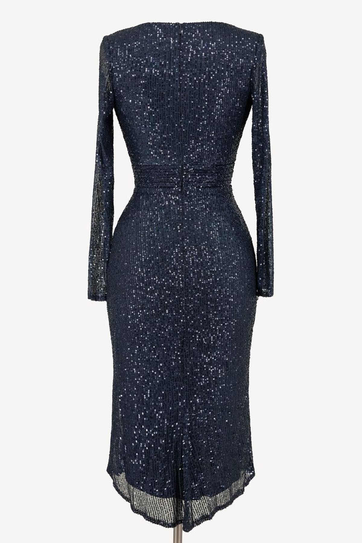Midnight sequin knee-length dress with long sleeves and fitted back
