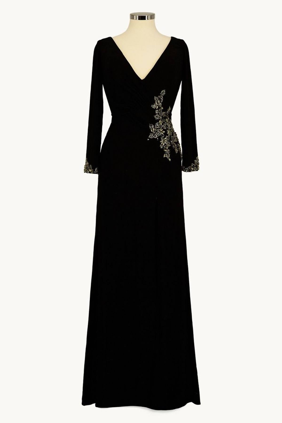 Black long-sleeve V-neck gown with floral beaded detail at waist