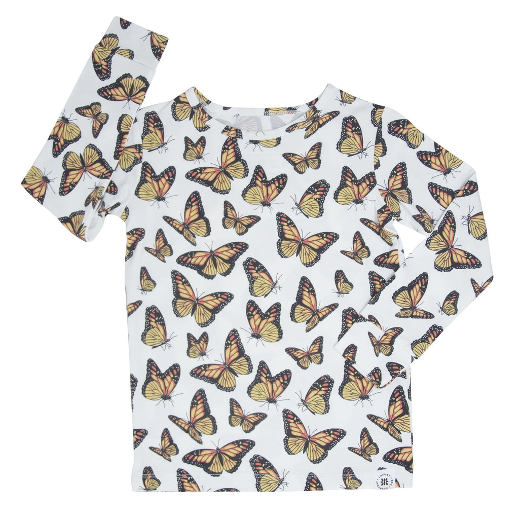 Kids pajama top, white short-sleeve shirt with scattered butterfly print