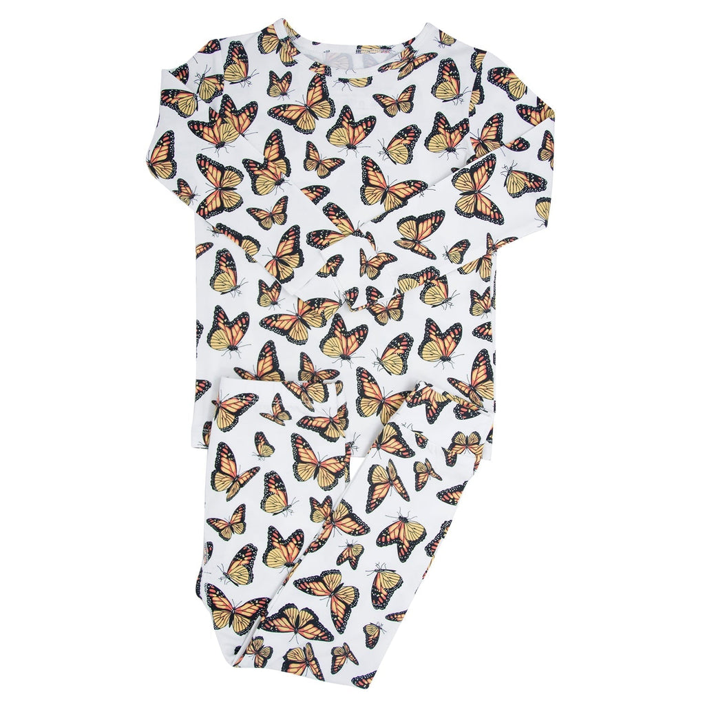 Kids pajama top, white crew-neck shirt with orange and black butterfly print