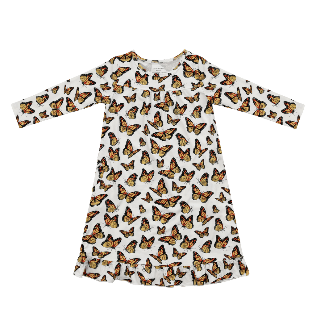 Long-sleeve butterfly print dress with white background, round neck, ruffle hem