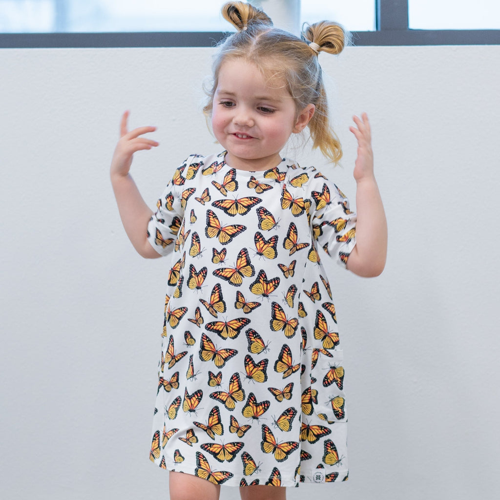 Girls short-sleeve tunic with colorful butterfly print, flared A-line fit