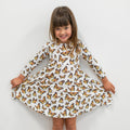 Girls' swirly dress with butterfly print, long sleeves, gathered skirt hem