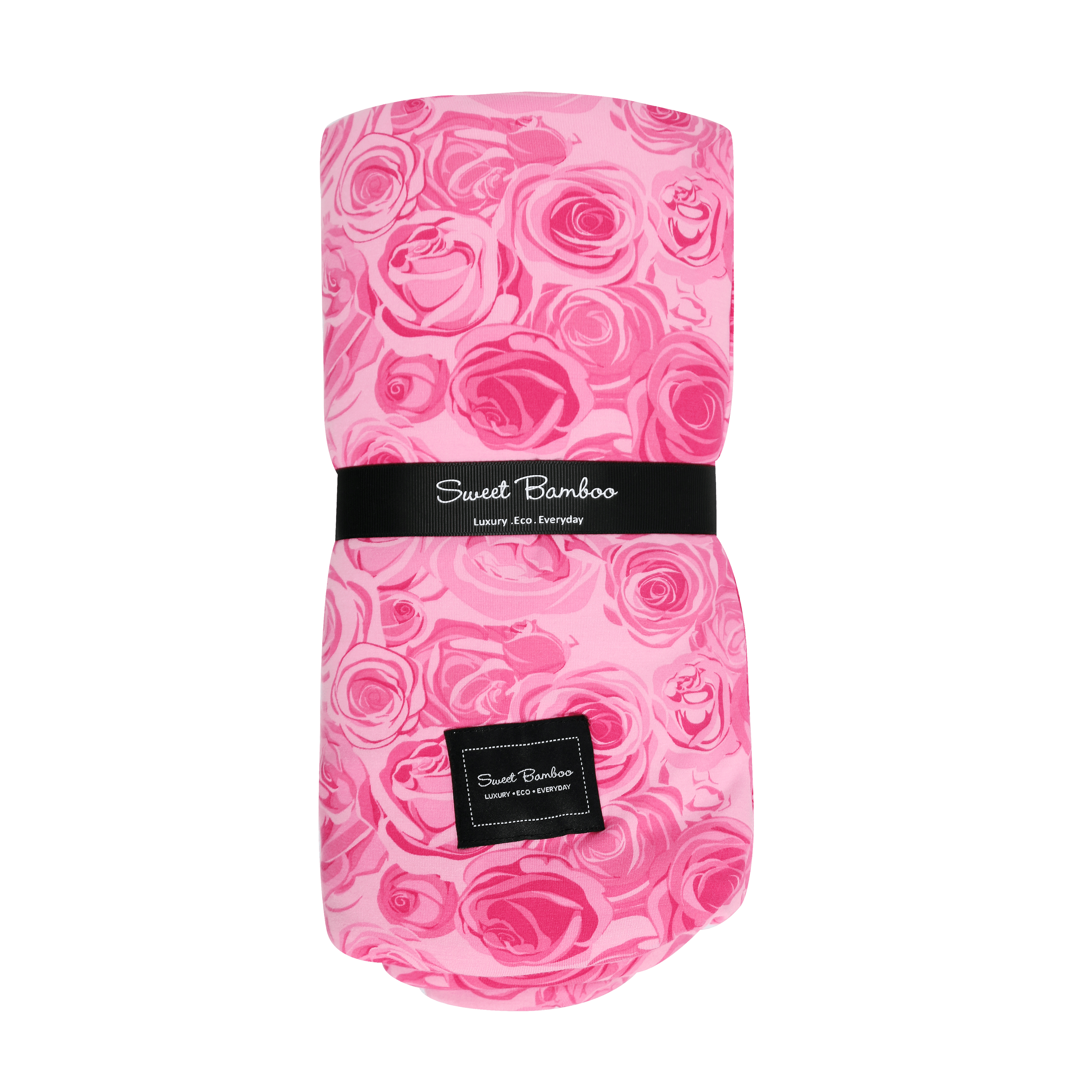 This Must Be Love cloud blanket with pink rose pattern, folded with branded black label
