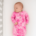 Girl's pink rose-print long-sleeve gown with button placket