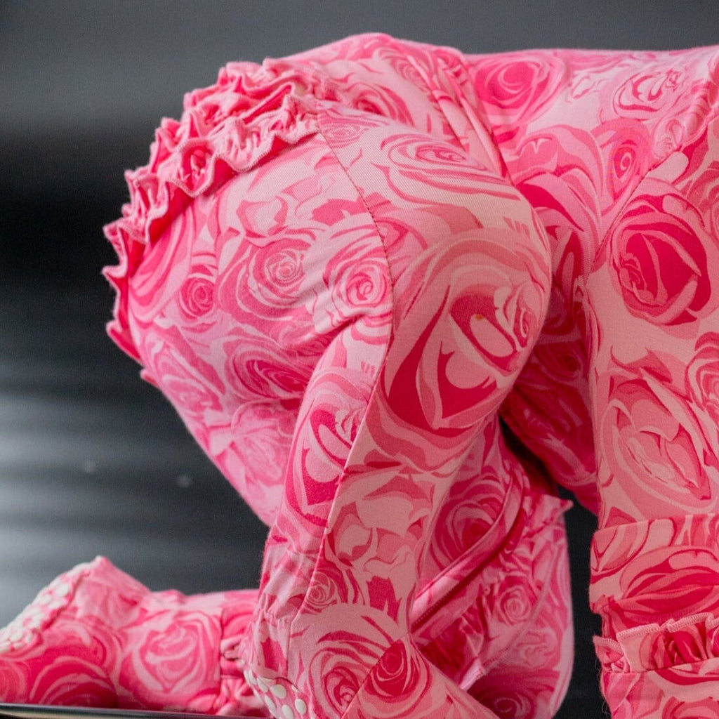 Pink rose-print ruffle footie with gathered shoulder and long sleeves