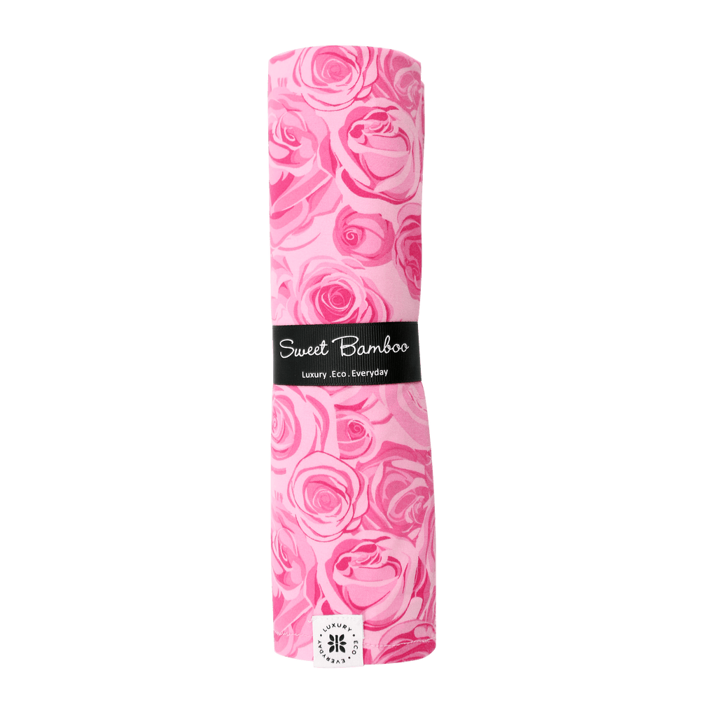 Sweet Bamboo pink rose swaddle blanket, slim packaged wrap with label