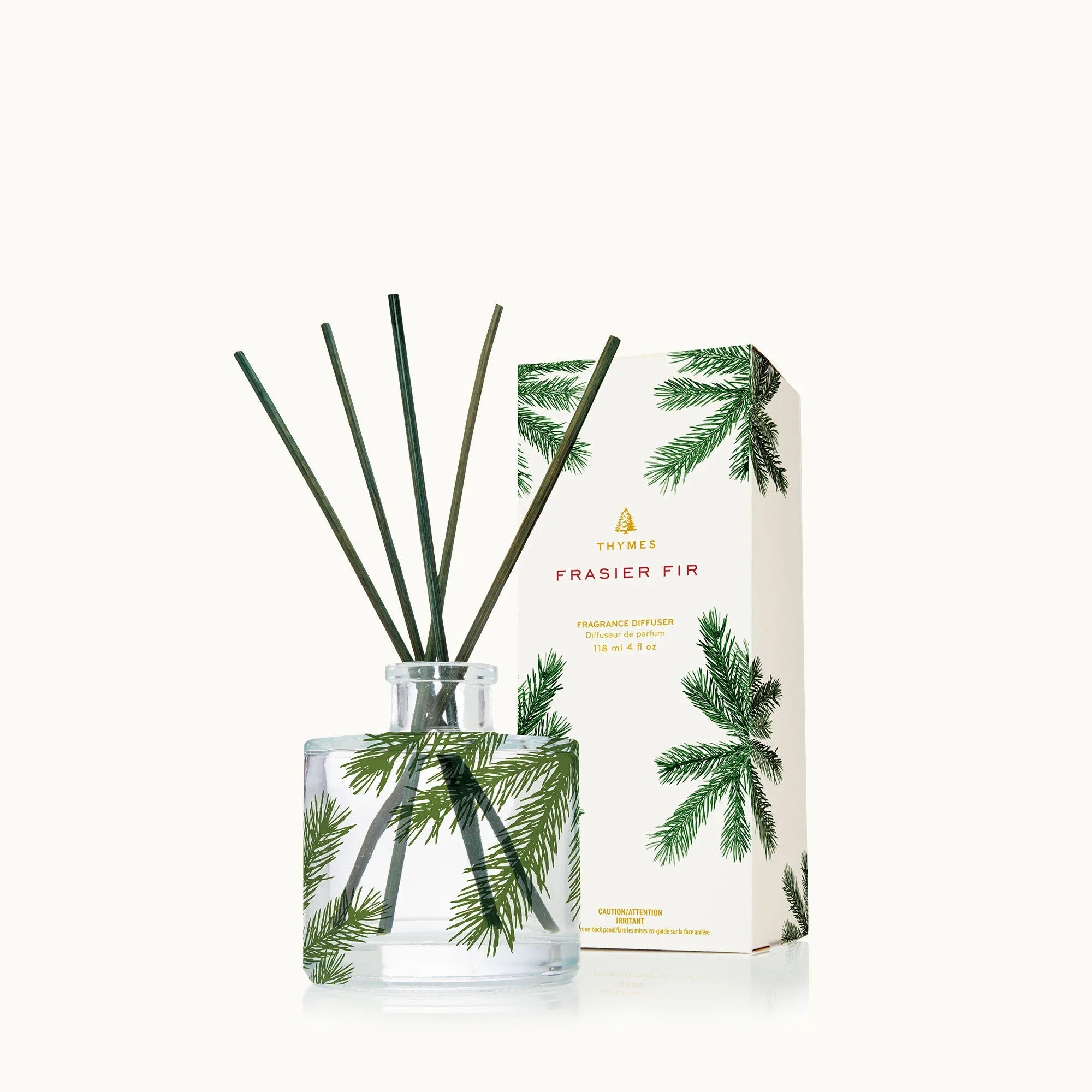Thymes Frasier Fir reed diffuser: glass bottle with pine reeds and boxed label, 4 fl oz