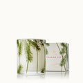 Pine needle scented candle in clear glass jar with green fir needle print