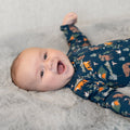 Navy animal-print zipper footie for baby boy