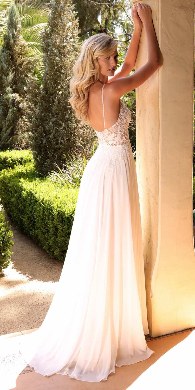 Off-white A-line chiffon gown with beaded floral bodice and flowing skirt