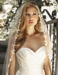 Off-white bridal veil with embroidered floral applique border along the edges