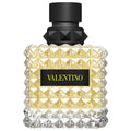 Valentino Eau de Parfum bottle with black cap and faceted gold glass