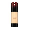 Kevyn Aucoin skin illuminating foundation bottle, deep warm beige base with black cap