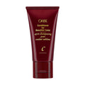 ORIBE conditioner tube, burgundy with centered gold C mark