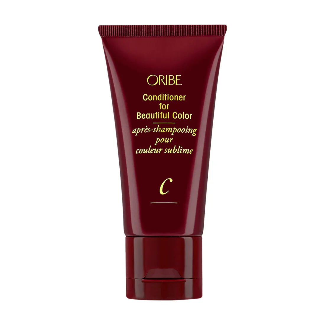 ORIBE conditioner tube, burgundy with centered gold C mark