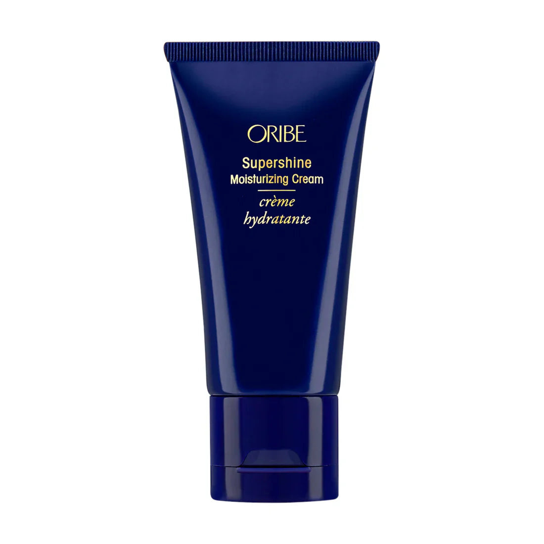 Oribe Supershine cream tube with navy-blue body and gold logo on front