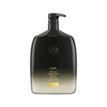 Oribe Gold Lust Repair & Restore Shampoo bottle with pump, black and gold label