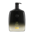 Oribe Gold Lust Repair and Restore Conditioner bottle, black pump bottle with gold label