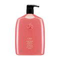 Oribe Bright Blonde shampoo with black pump, red-pink bottle and front logo