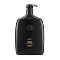 Oribe Signature Shampoo bottle, black with pump dispenser top and ORIBE text