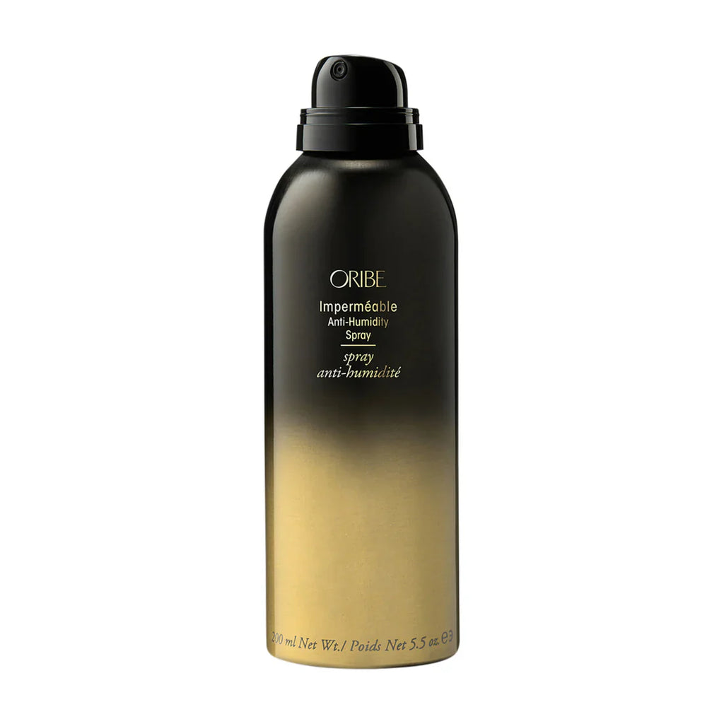 Oribe anti-humidity hair spray bottle with black cap, matte black and gold label