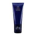 Oribe conditioner tube, dark blue with black cap and label