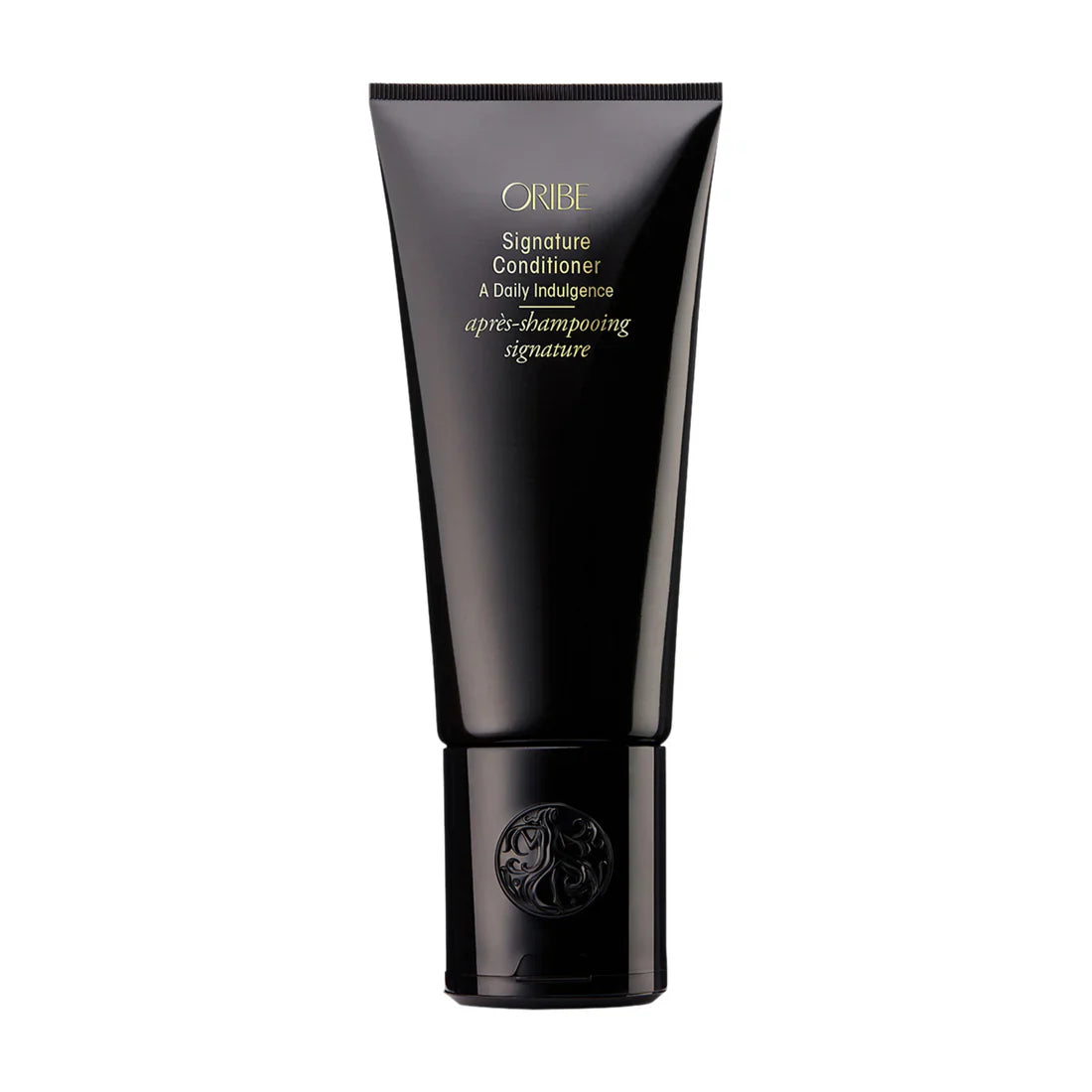 Oribe Signature Conditioner tube, black squeeze bottle with gold logo