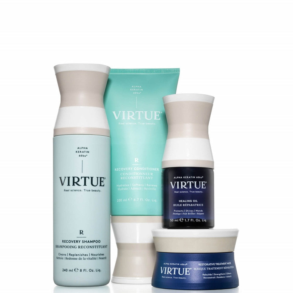 Skincare set with three bottles and one jar in mint, beige, and navy