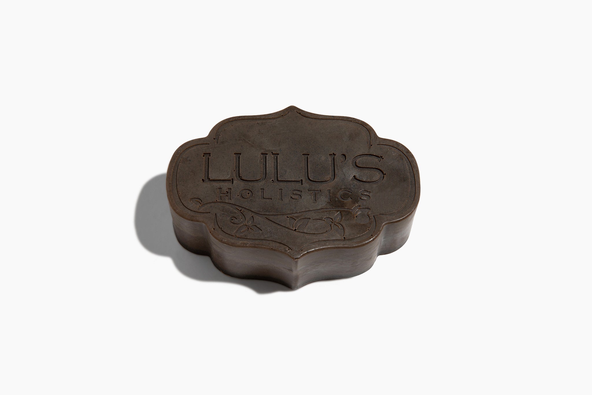 Flower-shaped bar soap, dark brown, LULU'S HOLISTIC logo imprint