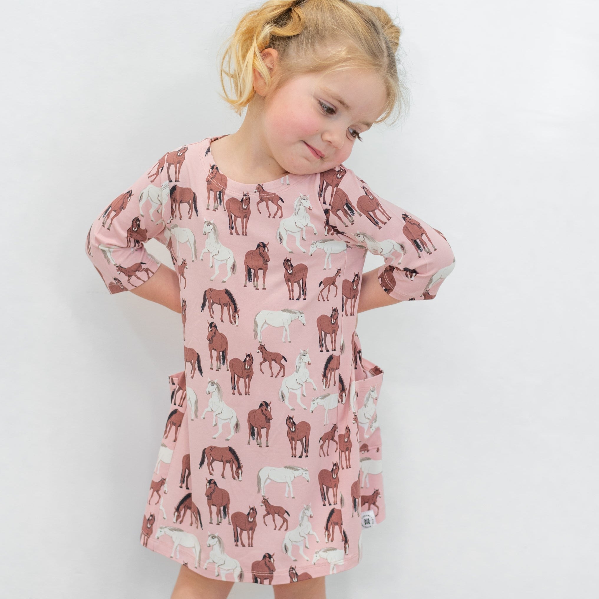 Girls' horse-print tunic in dusty pink with short sleeves and crew neckline