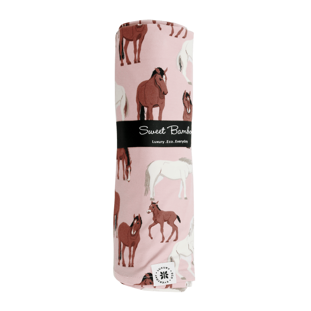 Horse-print swaddle blanket package, light pink with brown horses; Sweet Bamboo logo