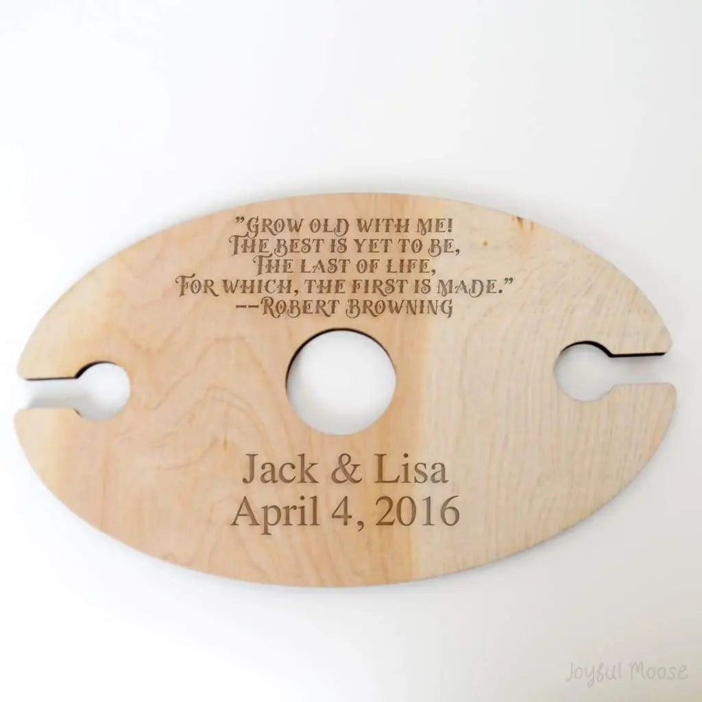 Personalized wood wine glass holder with three cutouts and etched wedding date