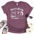 Maroon women’s graphic T-shirt with “Mom’s sanity” text and coffee & wine design