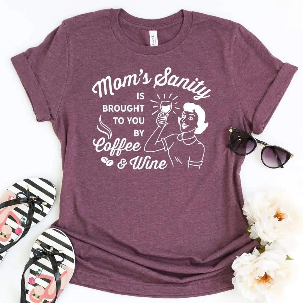 Maroon women’s graphic T-shirt with “Mom’s sanity” text and coffee & wine design
