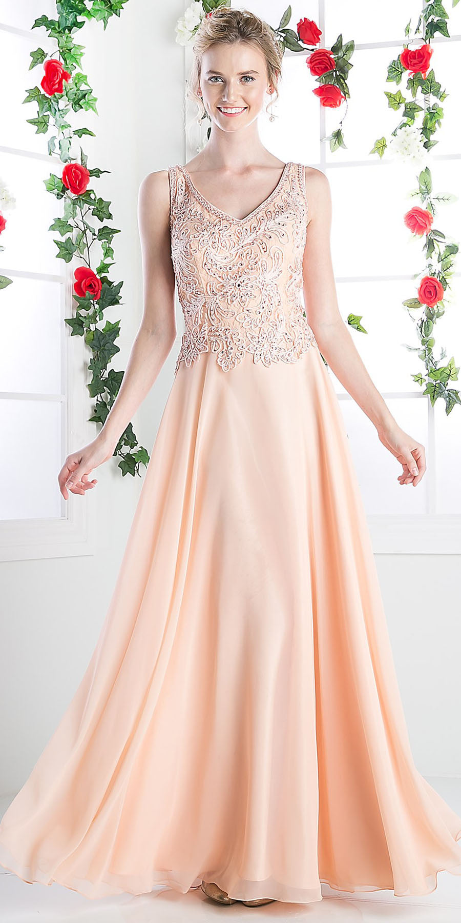 Peach V-neck sleeveless dress with lace bodice and flowing maxi skirt