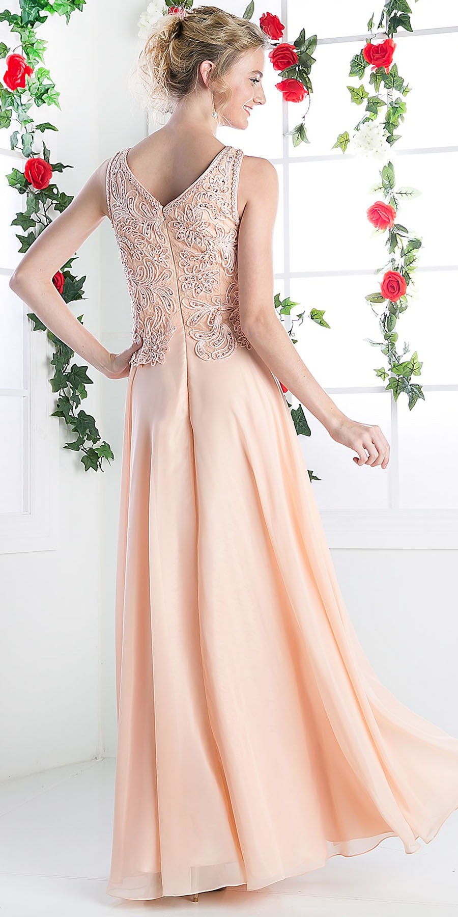 Peach V-neck sleeveless dress with lace bodice and open back detail
