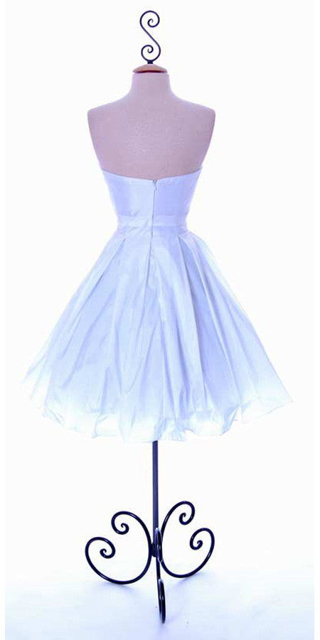 White strapless A-line dress with gathered bodice and full flared tulle skirt