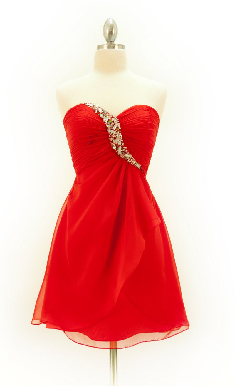 Red strapless chiffon short dress on mannequin with jeweled waistband and layered skirt