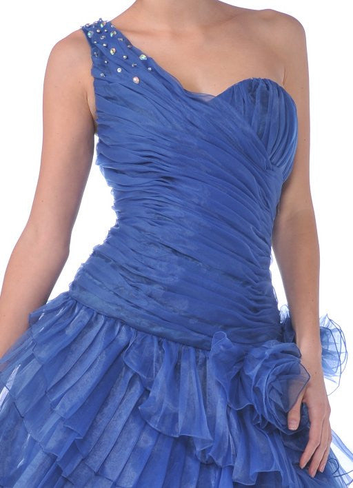 One-shoulder ruffled dress close-up, blue satin bodice with rhinestone strap detail