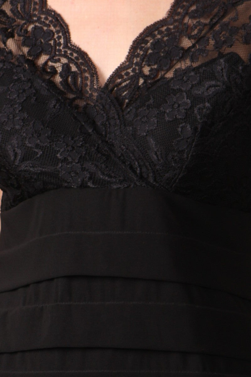 Black lace bodice detail with sweetheart neckline and ruched skirt