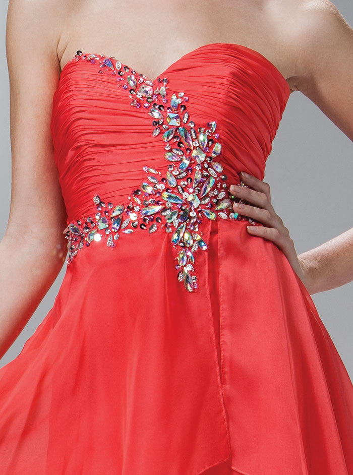 Coral strapless dress close-up of rhinestone embellished ruched bodice