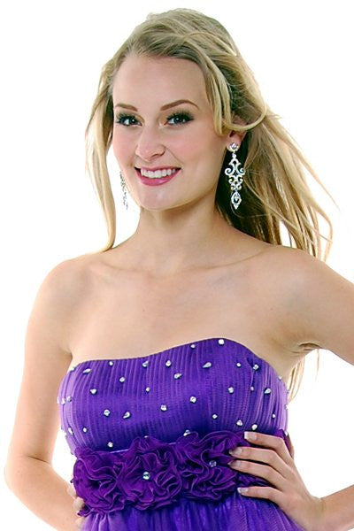 A-line tulle dress close-up: purple strapless bodice with rhinestones and rosette detail