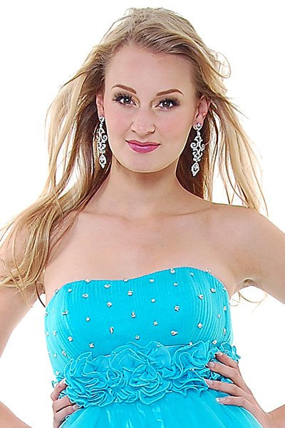 Turquoise strapless bodice of tulle with rhinestone accents and layered ruffle detail