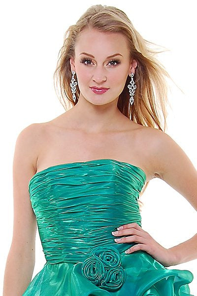 Emerald green strapless ruched dress with metallic texture and waist rosette detail